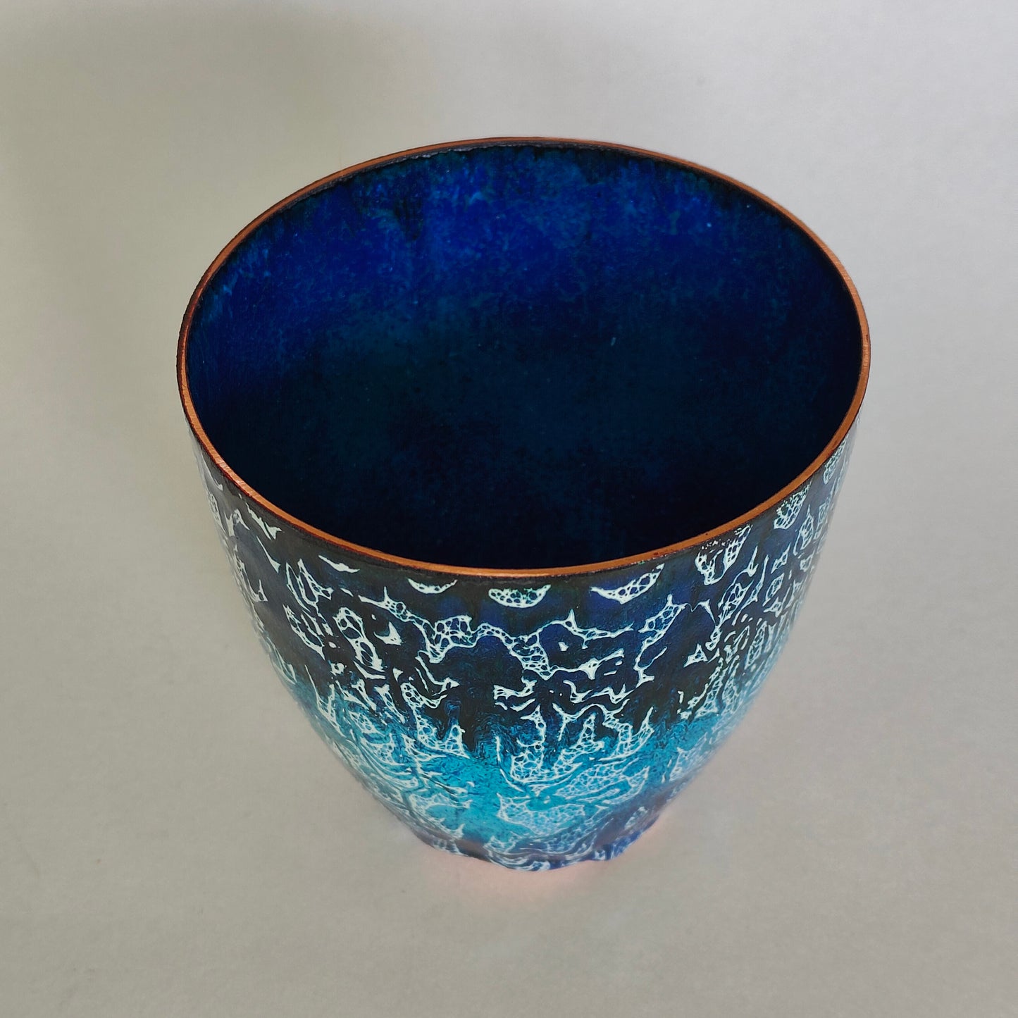 Blue floral enamel on copper bowl