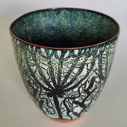 Black and yellow cow parsley enamel on copper vessel.